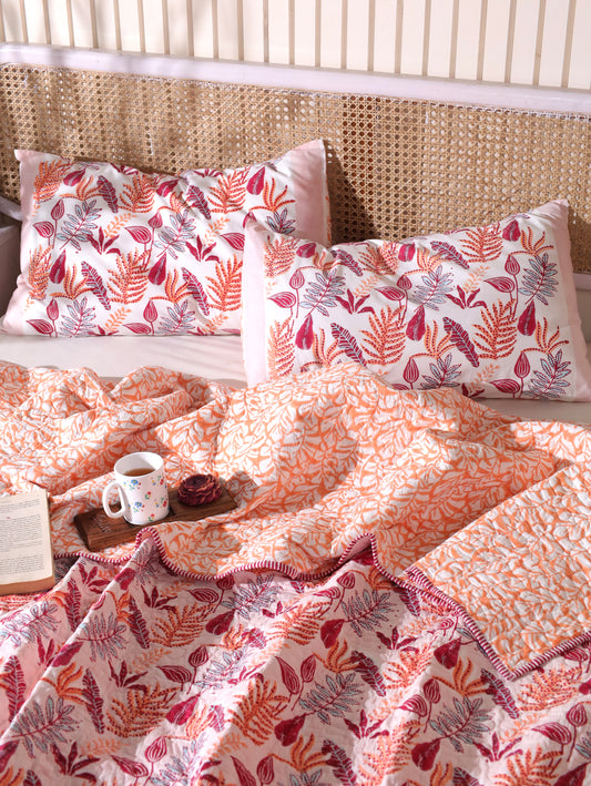 Red and peach forest garden mulmul quilt