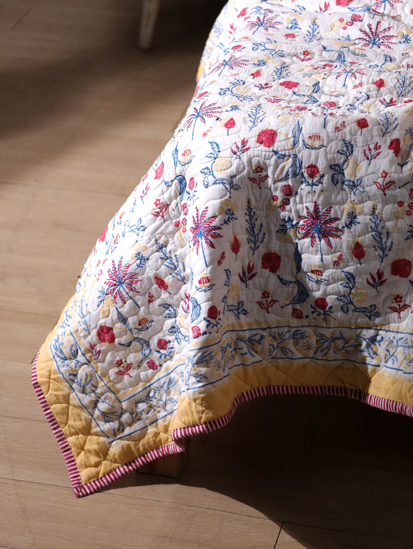 Magenta yellow and blue nariyal tree mulmul quilt (scattered floral)