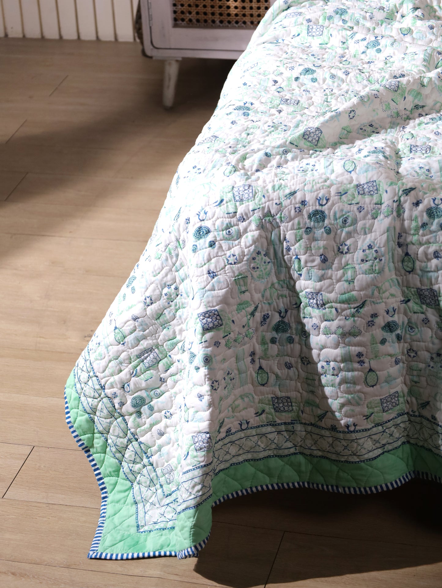 Blue and sea green scattered ethnic mulmul quilt