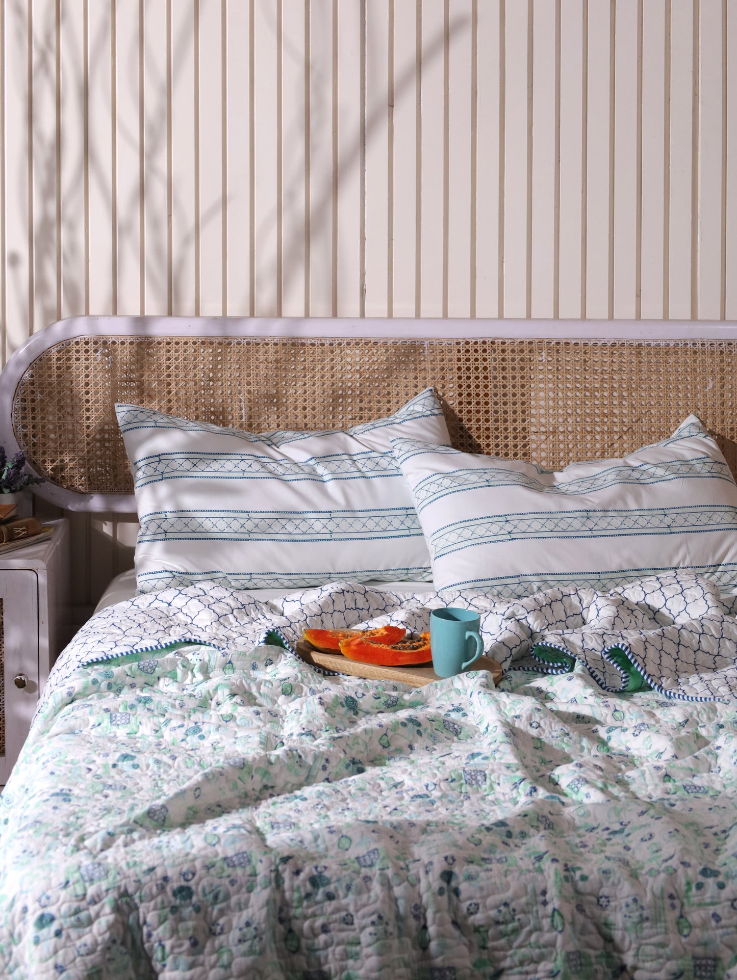 Blue and sea green scattered ethnic mulmul quilt
