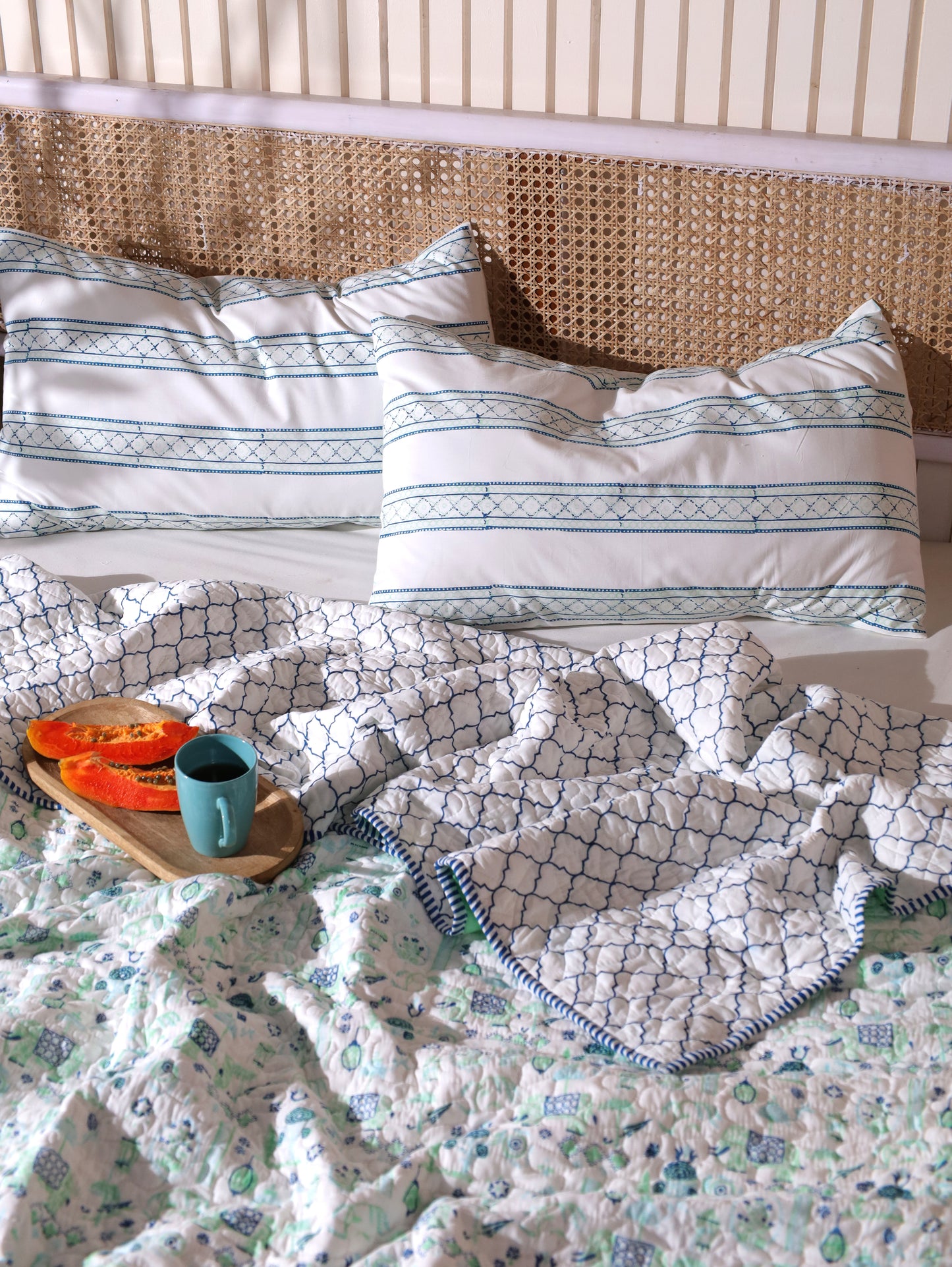 Blue and sea green scattered ethnic mulmul quilt