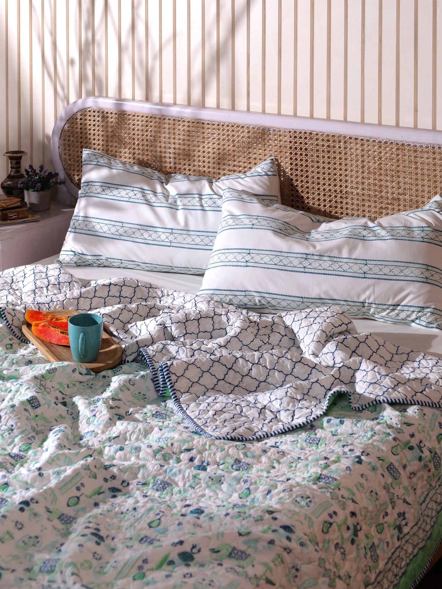 Blue and sea green scattered ethnic mulmul quilt