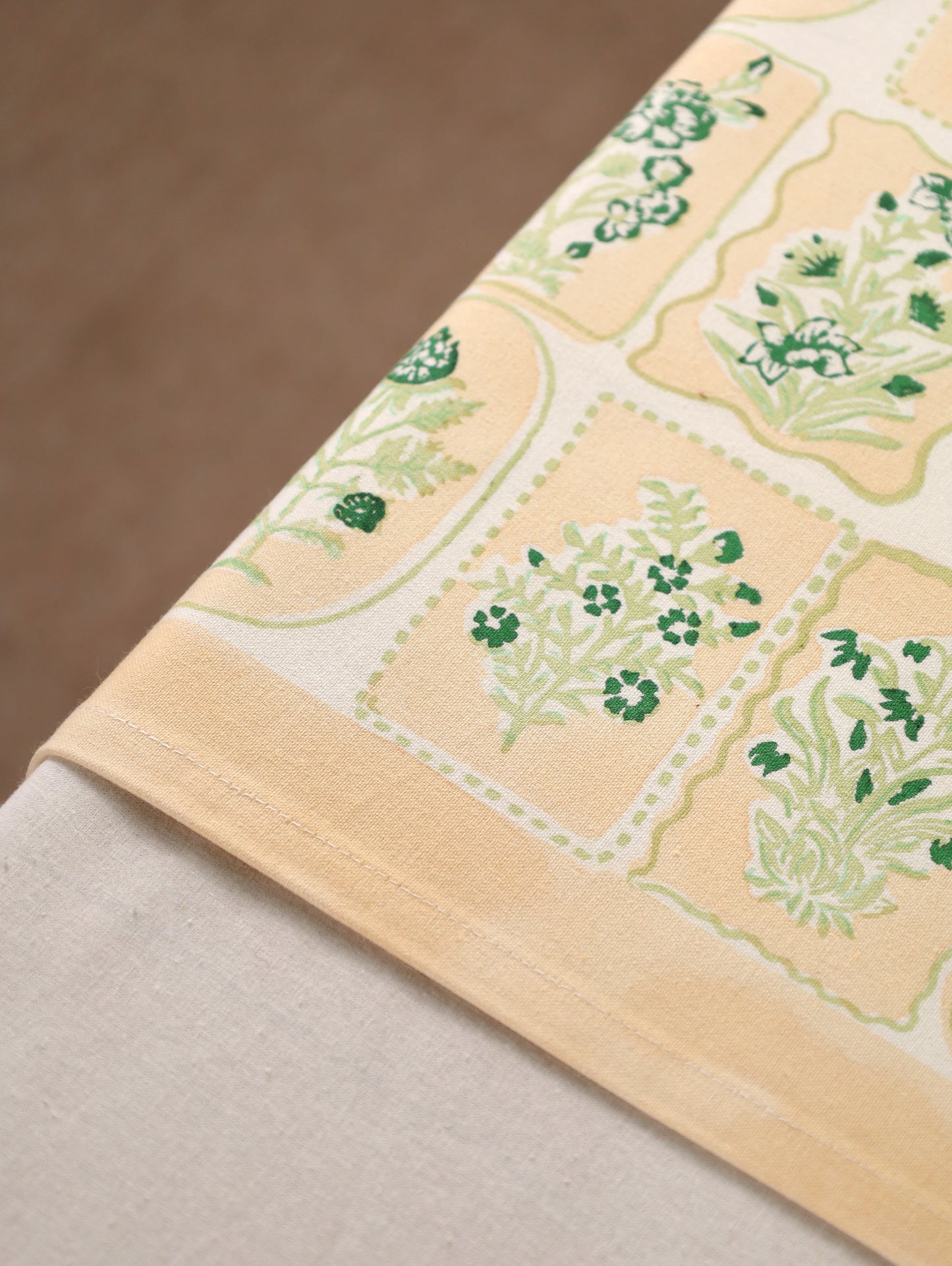 Green parrot and yellow motif tiles table runner