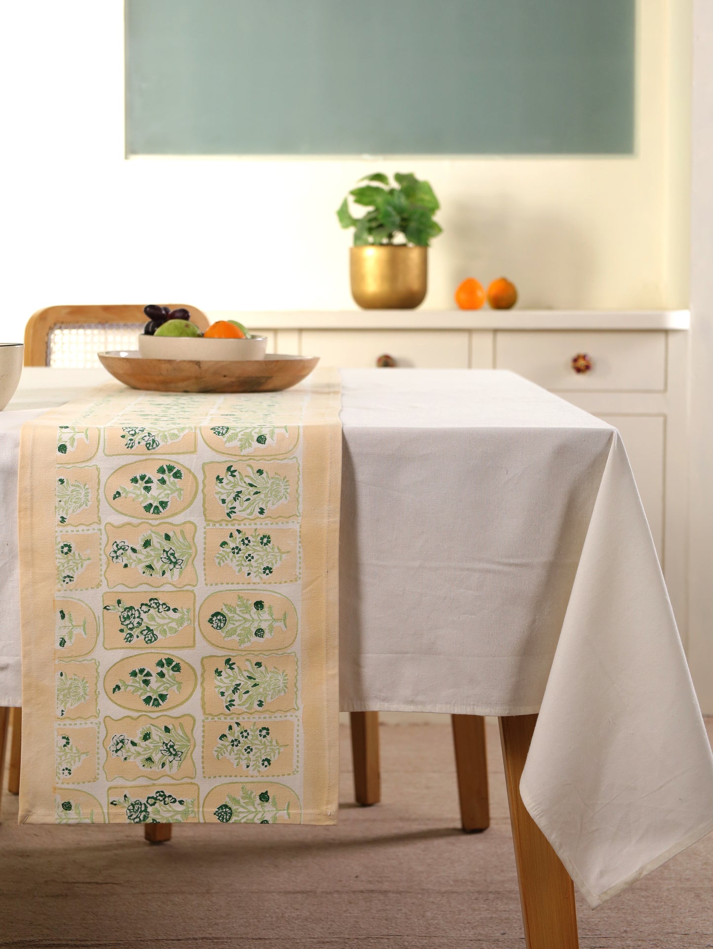 Green parrot and yellow motif tiles table runner