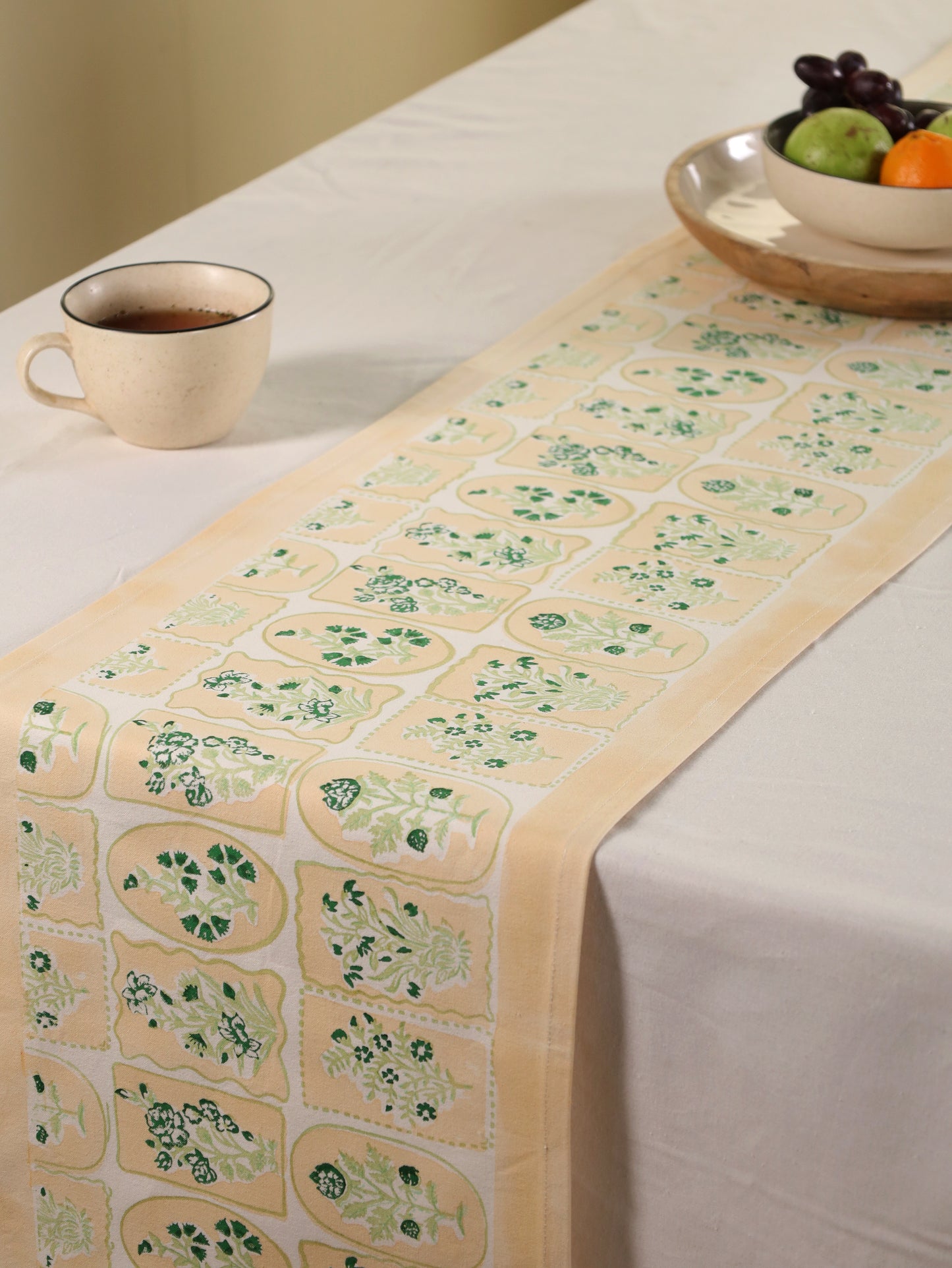 Green parrot and yellow motif tiles table runner
