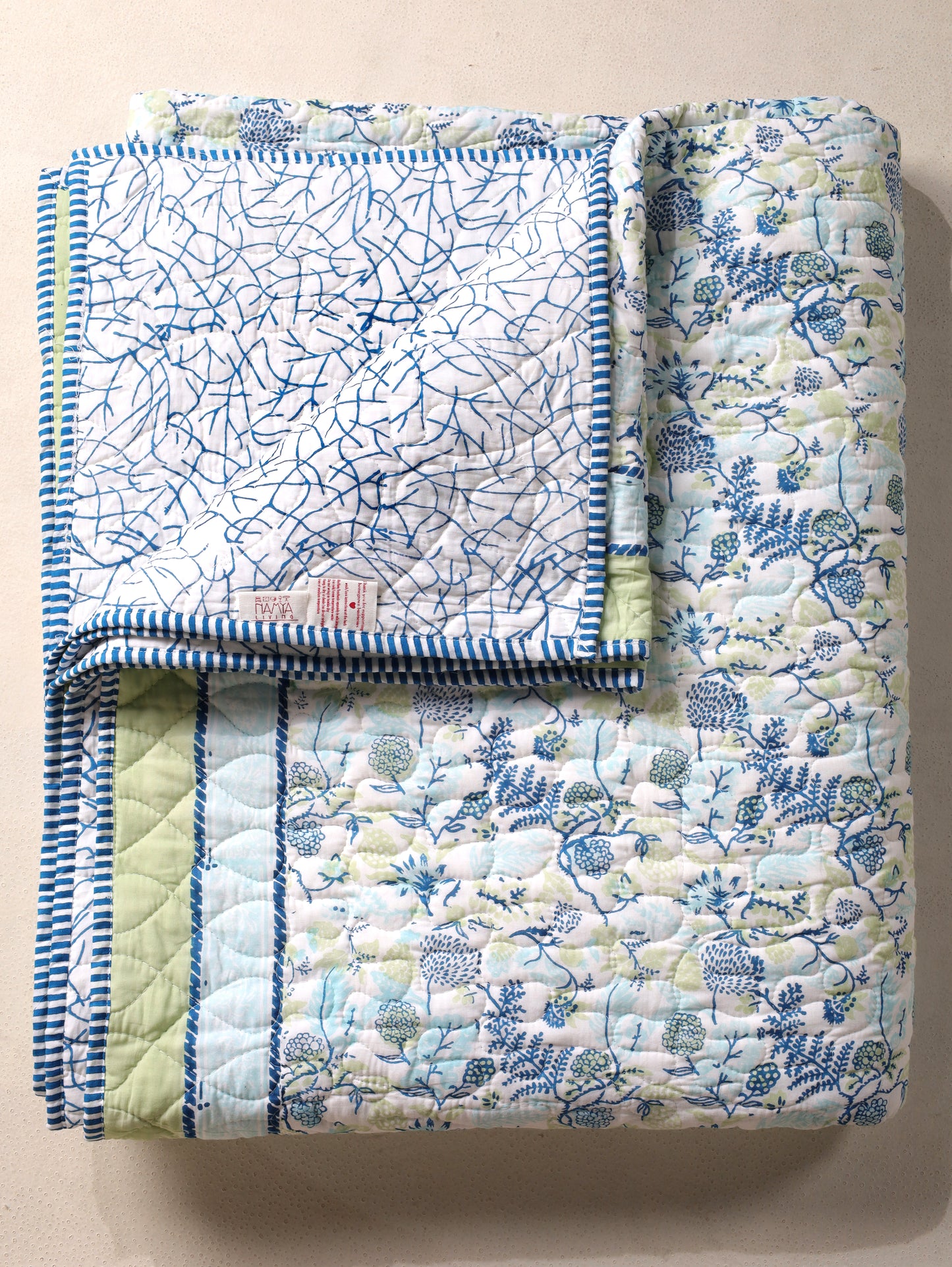 Blues and parrot kamal phool mulmul quilt (floral jaal)