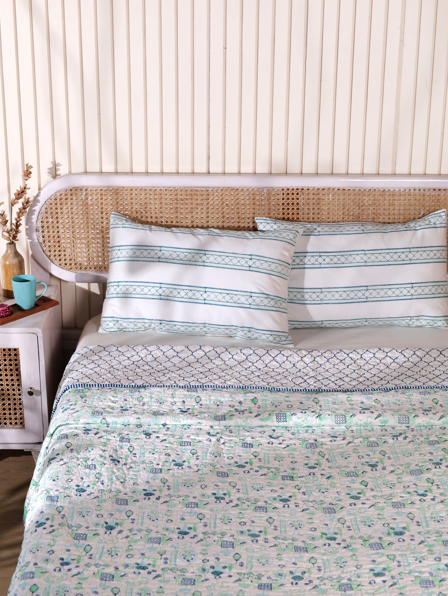 Blue and sea green scattered ethnic mulmul quilt
