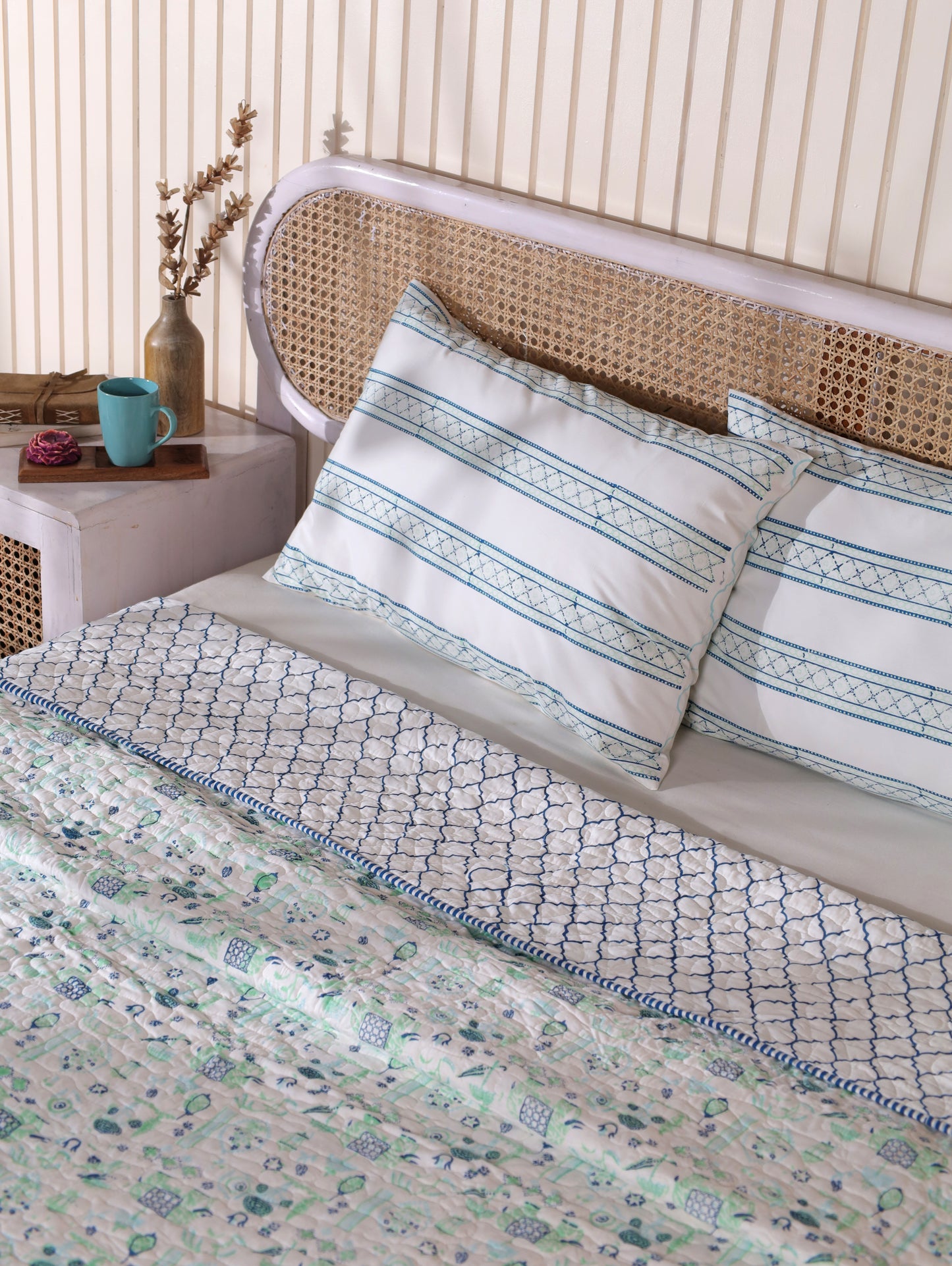 Blue and sea green scattered ethnic mulmul quilt