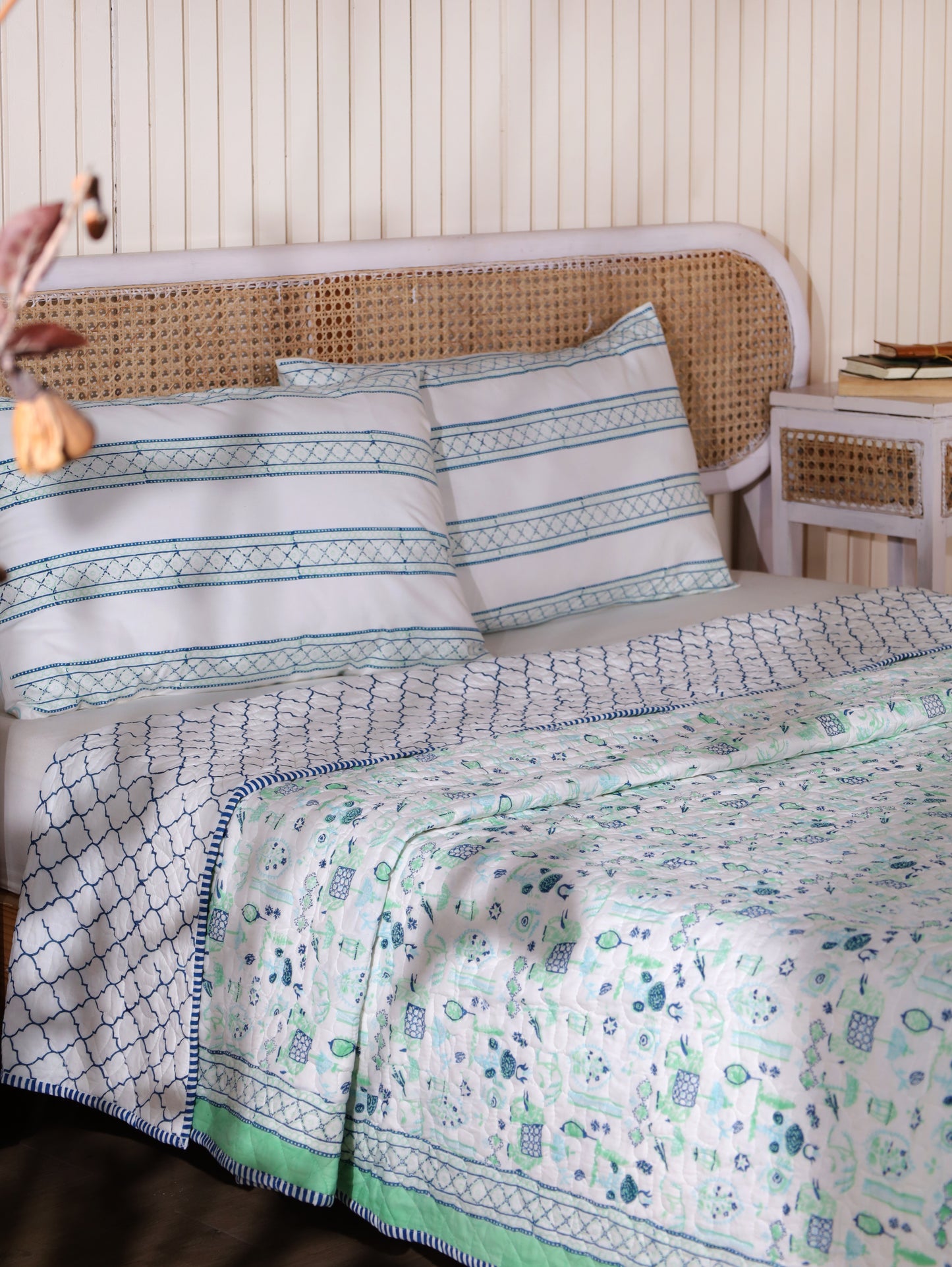 Blue and sea green scattered ethnic mulmul quilt