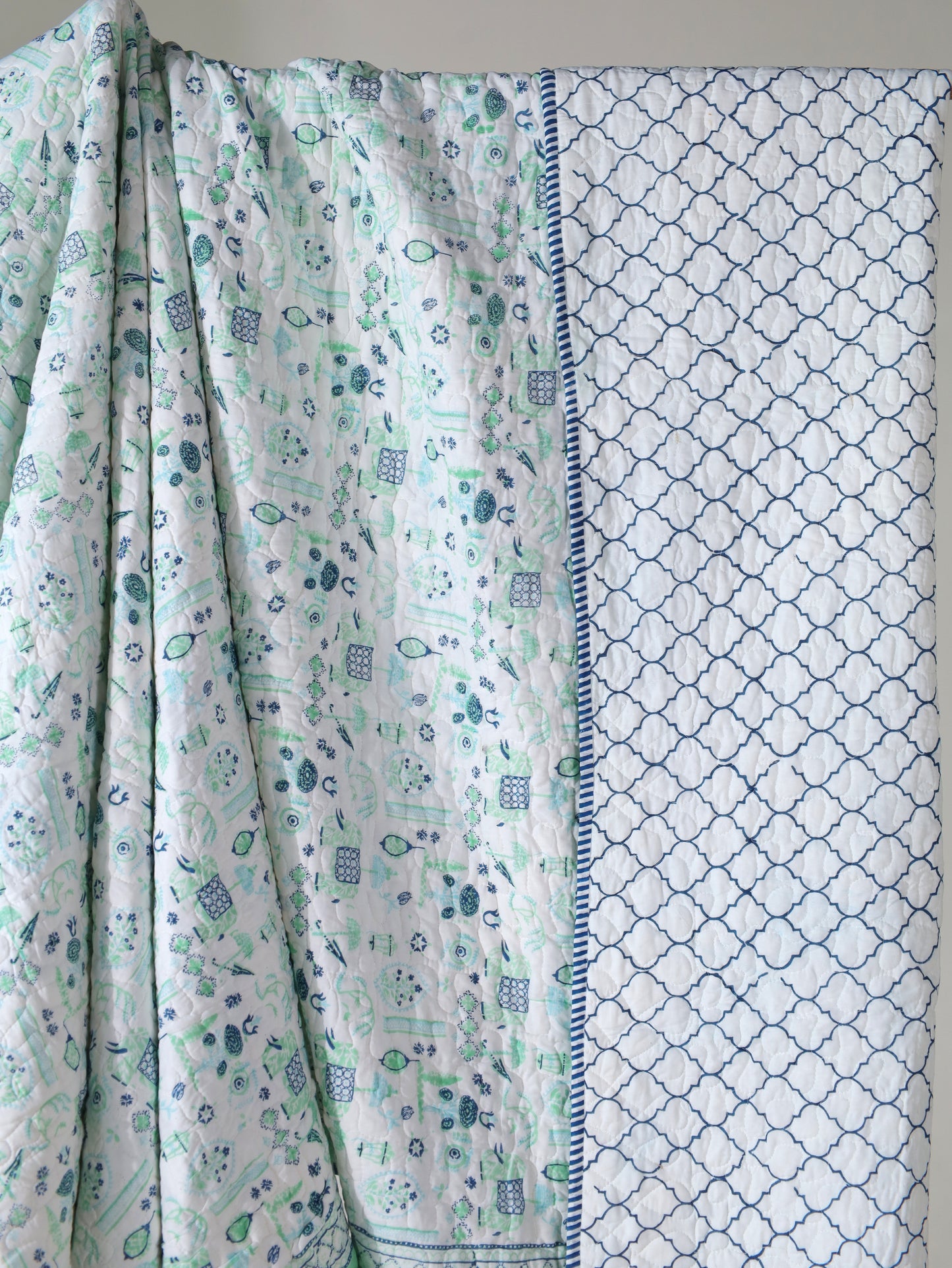 Blue and sea green scattered ethnic mulmul quilt