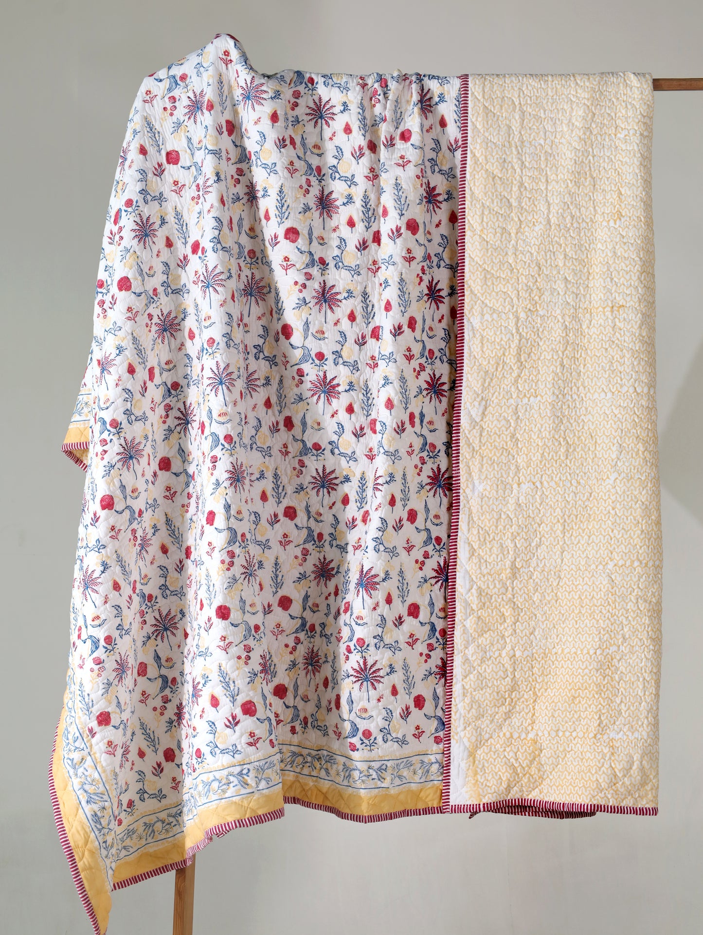 Magenta yellow and blue nariyal tree mulmul quilt (scattered floral)