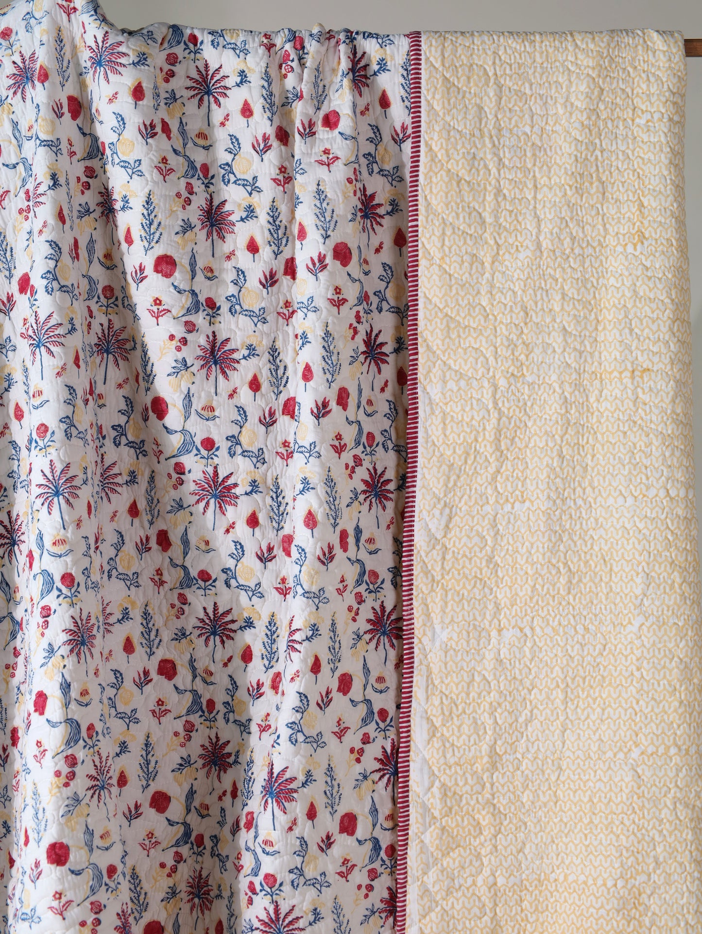 Magenta yellow and blue nariyal tree mulmul quilt (scattered floral)