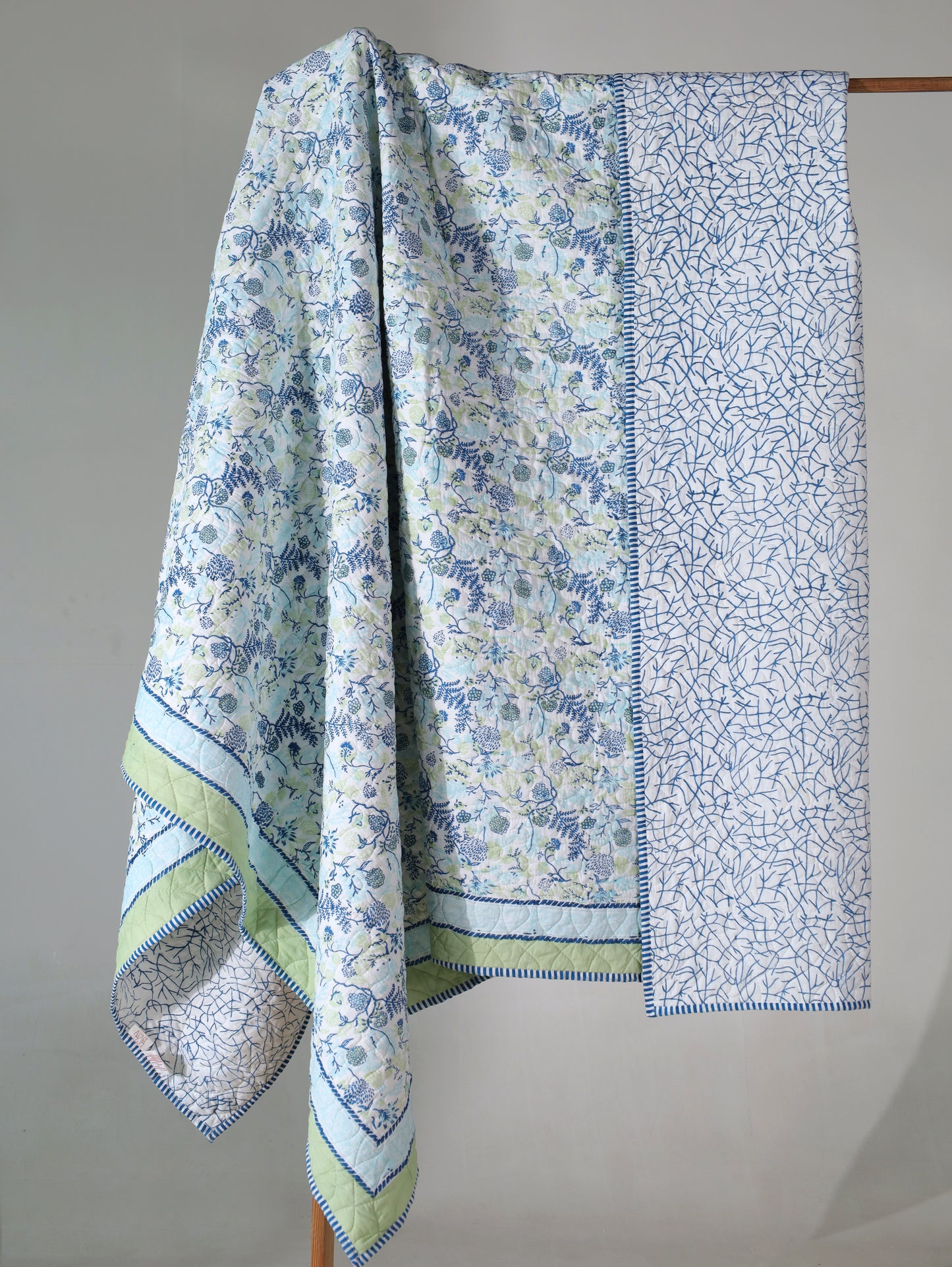 Blues and parrot kamal phool mulmul quilt (floral jaal)