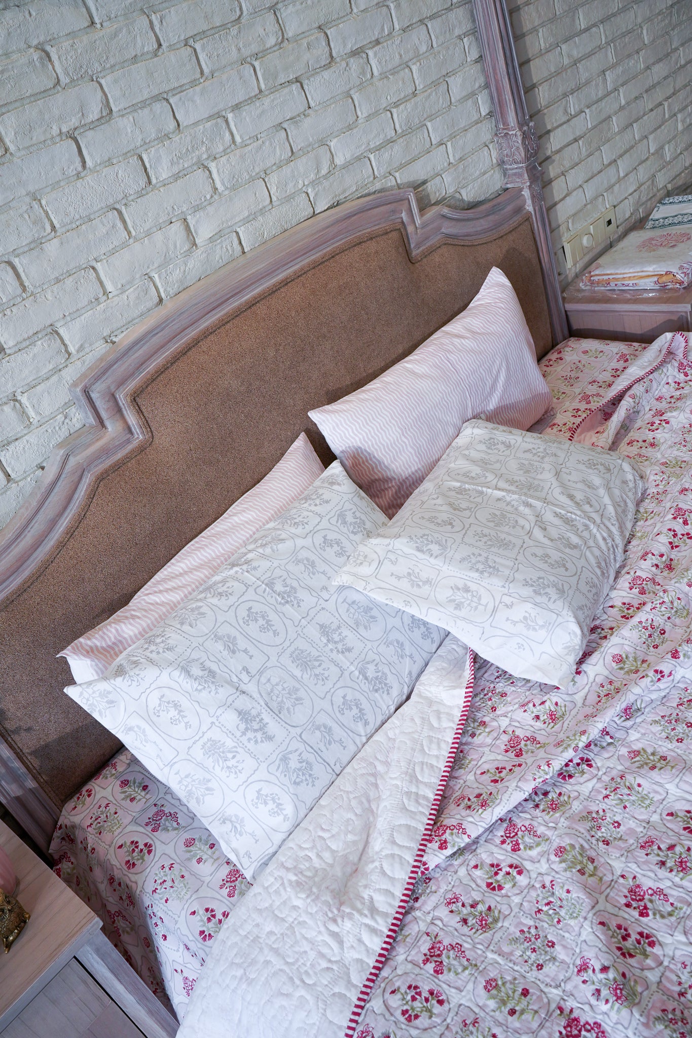 Magenta and green motif tiles mulmul quilt