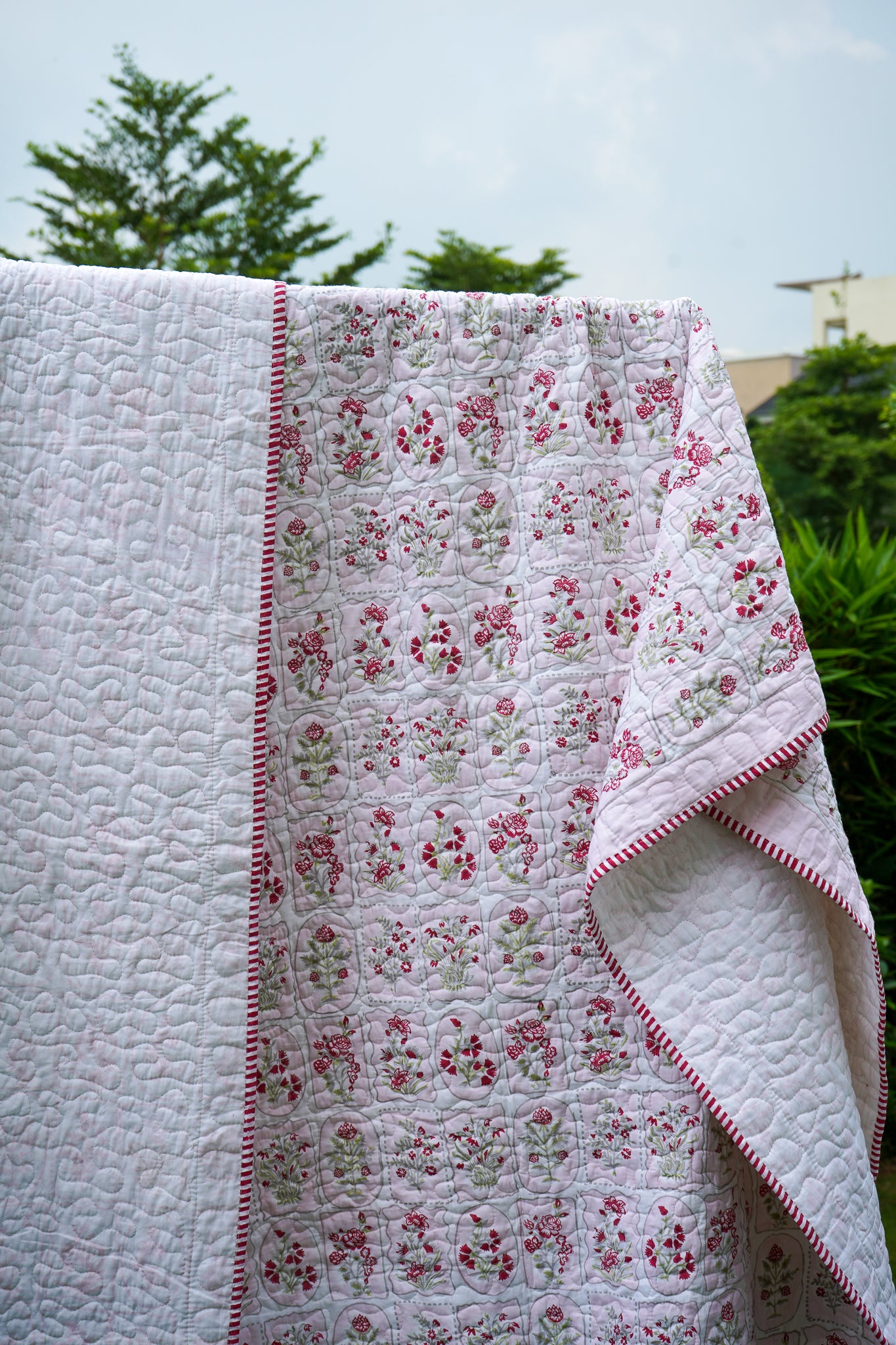 Magenta and green motif tiles mulmul quilt