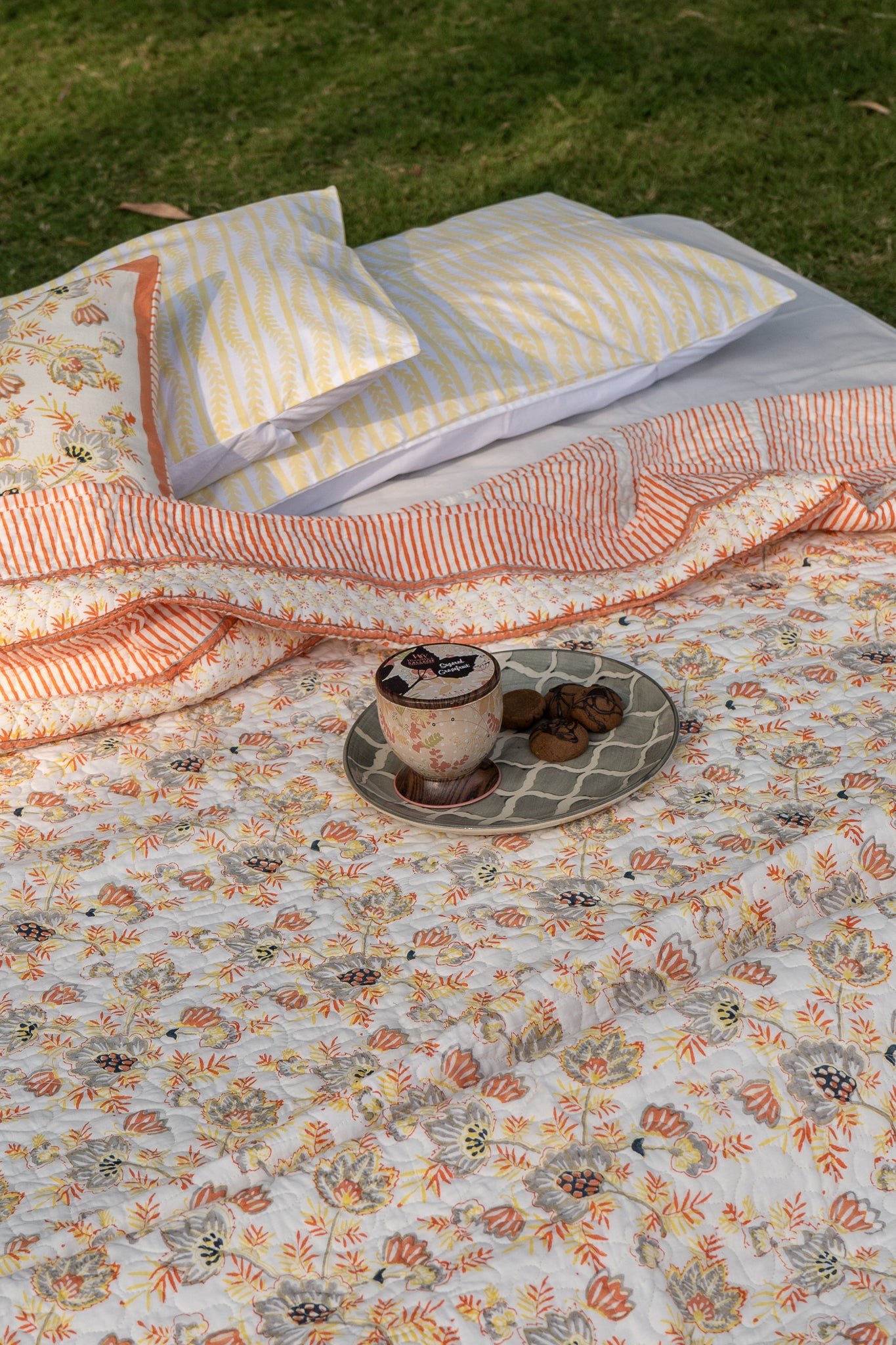 Grey and orange patte pe patta mulmul quilt