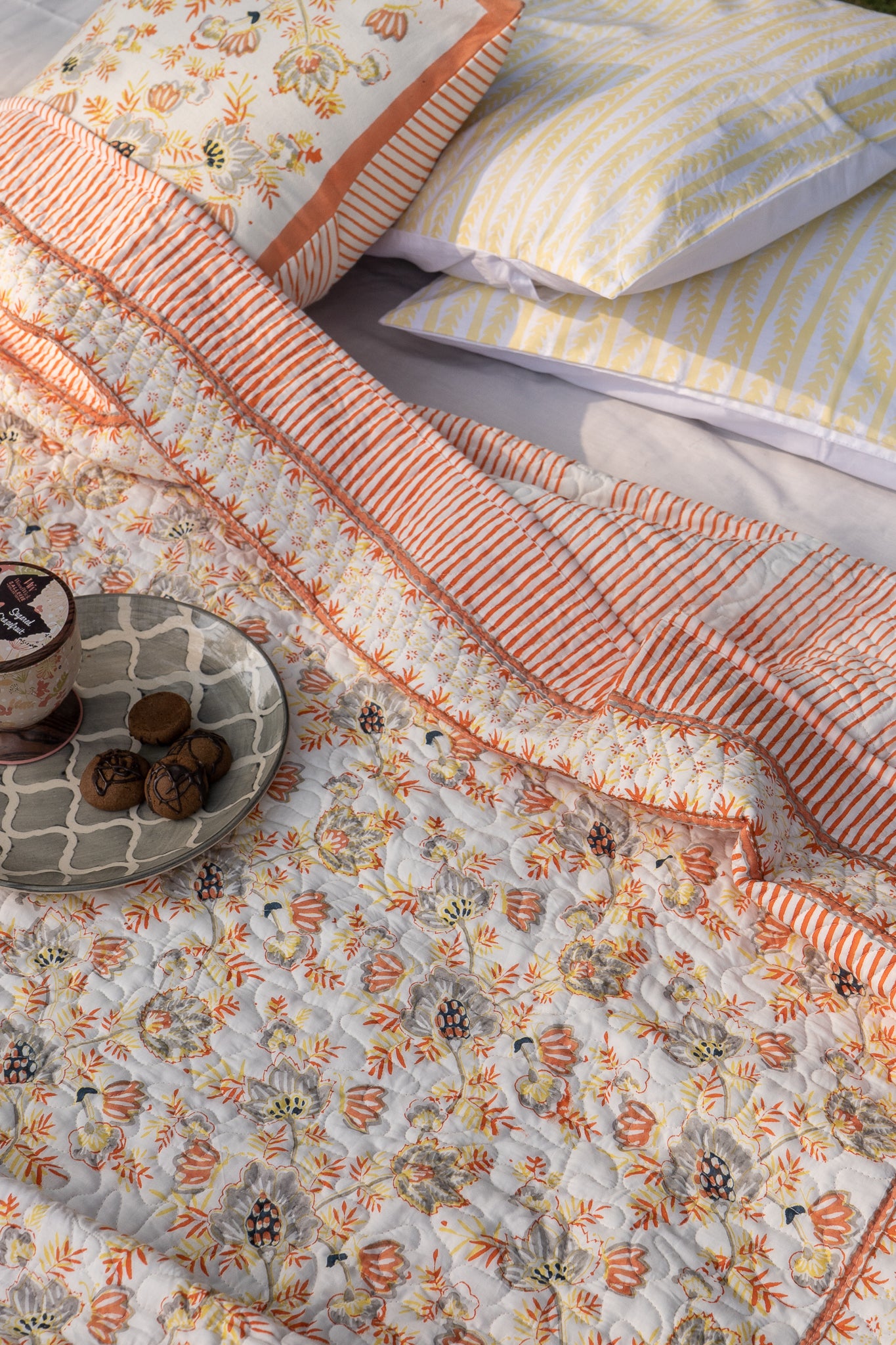 Grey and orange patte pe patta mulmul quilt