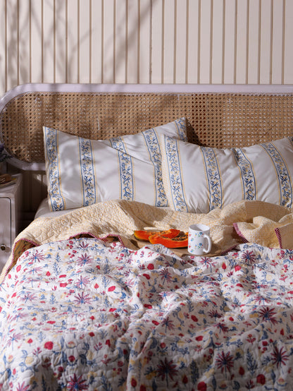 Magenta yellow and blue nariyal tree mulmul quilt (scattered floral)