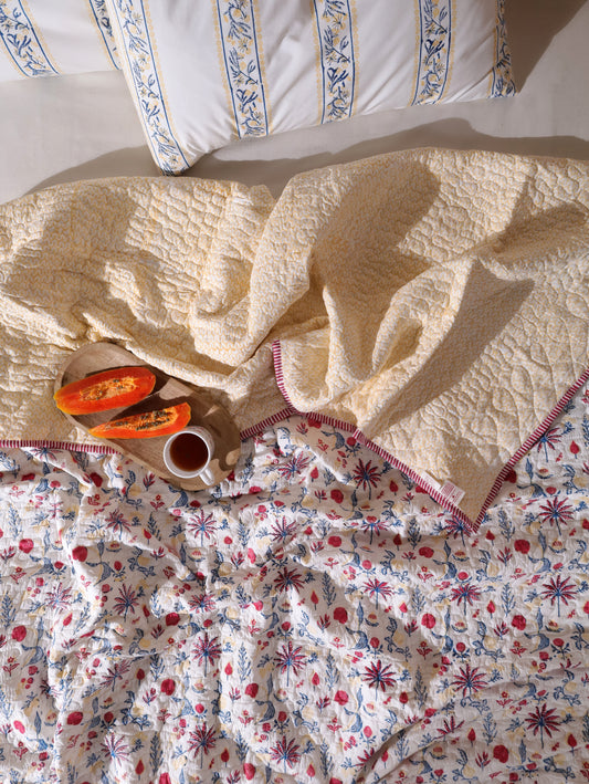 Magenta yellow and blue nariyal tree mulmul quilt (scattered floral)