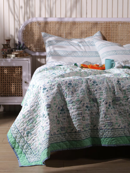 Blue and sea green scattered ethnic mulmul quilt