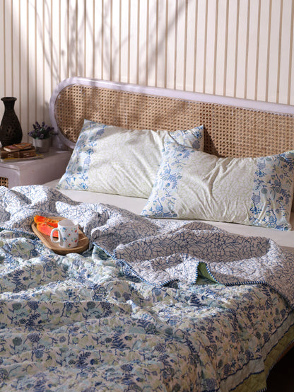 Blues and parrot kamal phool mulmul quilt (floral jaal)