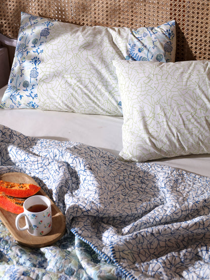 Blues and parrot kamal phool mulmul quilt (floral jaal)