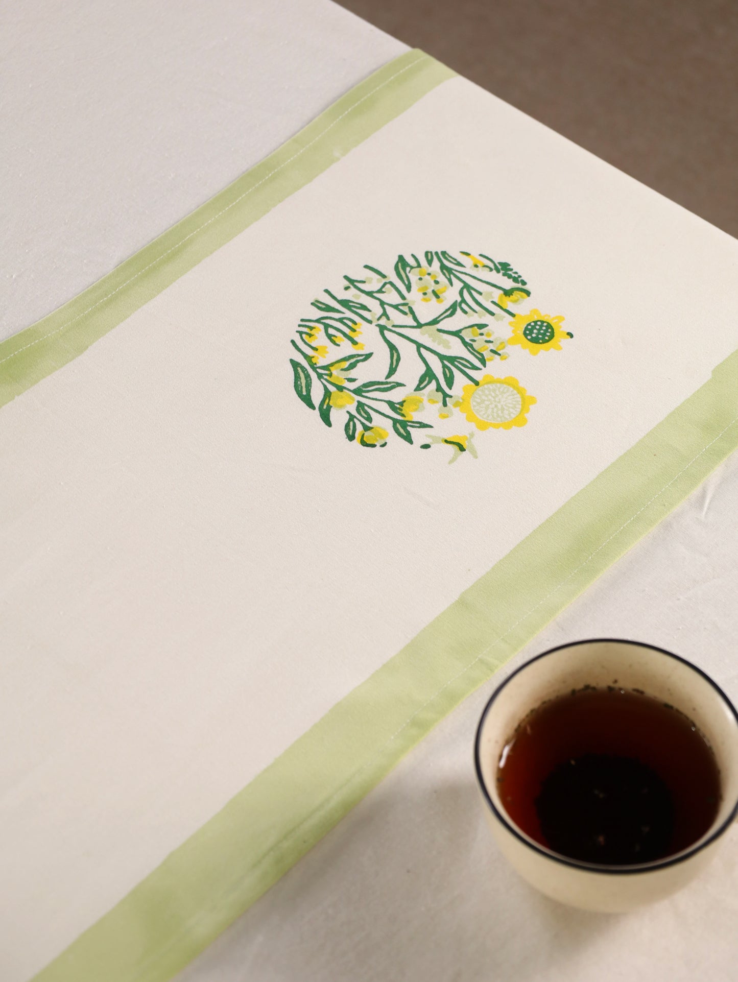 Green parrot and yellow phool bagh motif table runner
