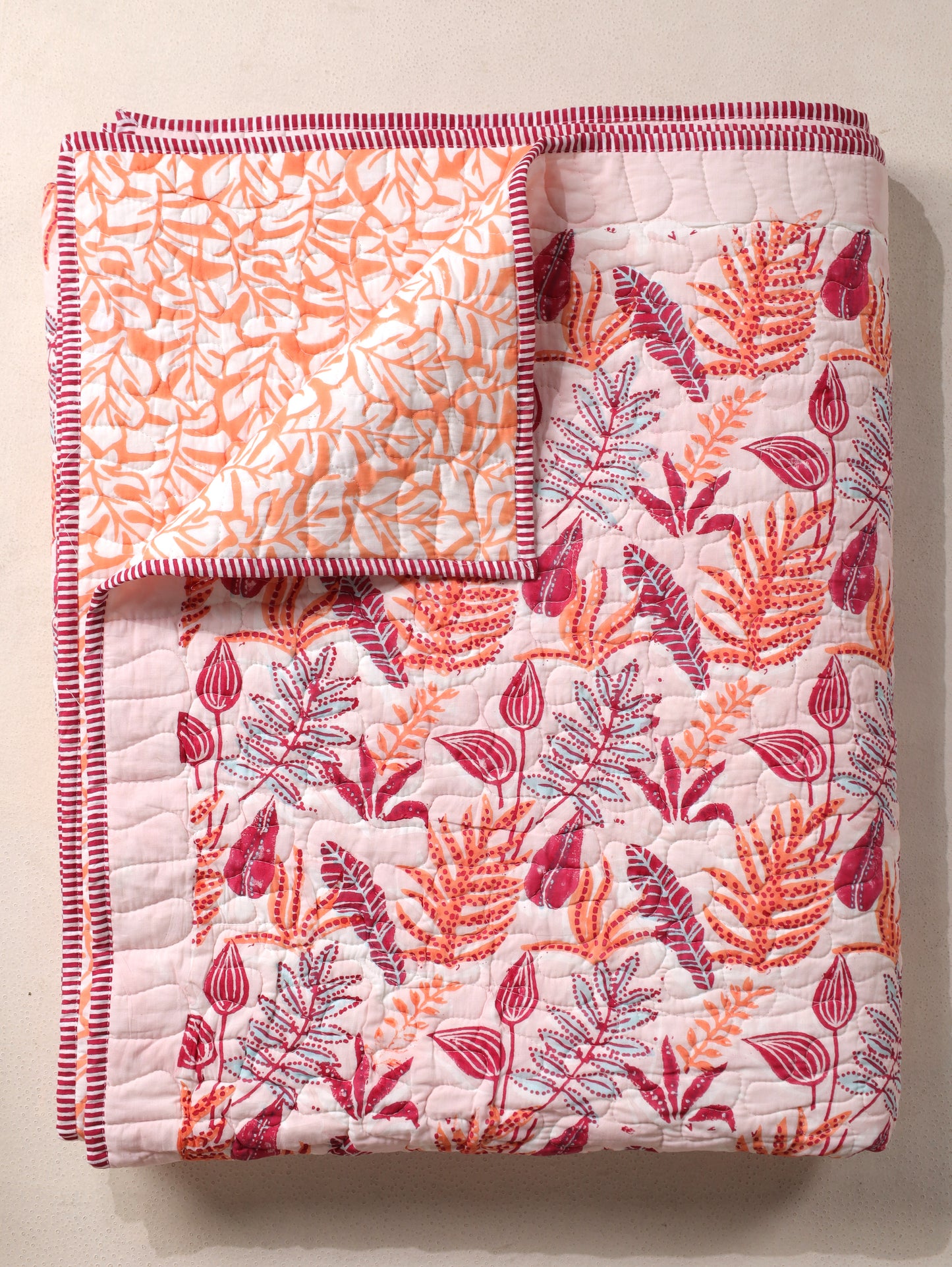 Red and peach forest garden mulmul quilt
