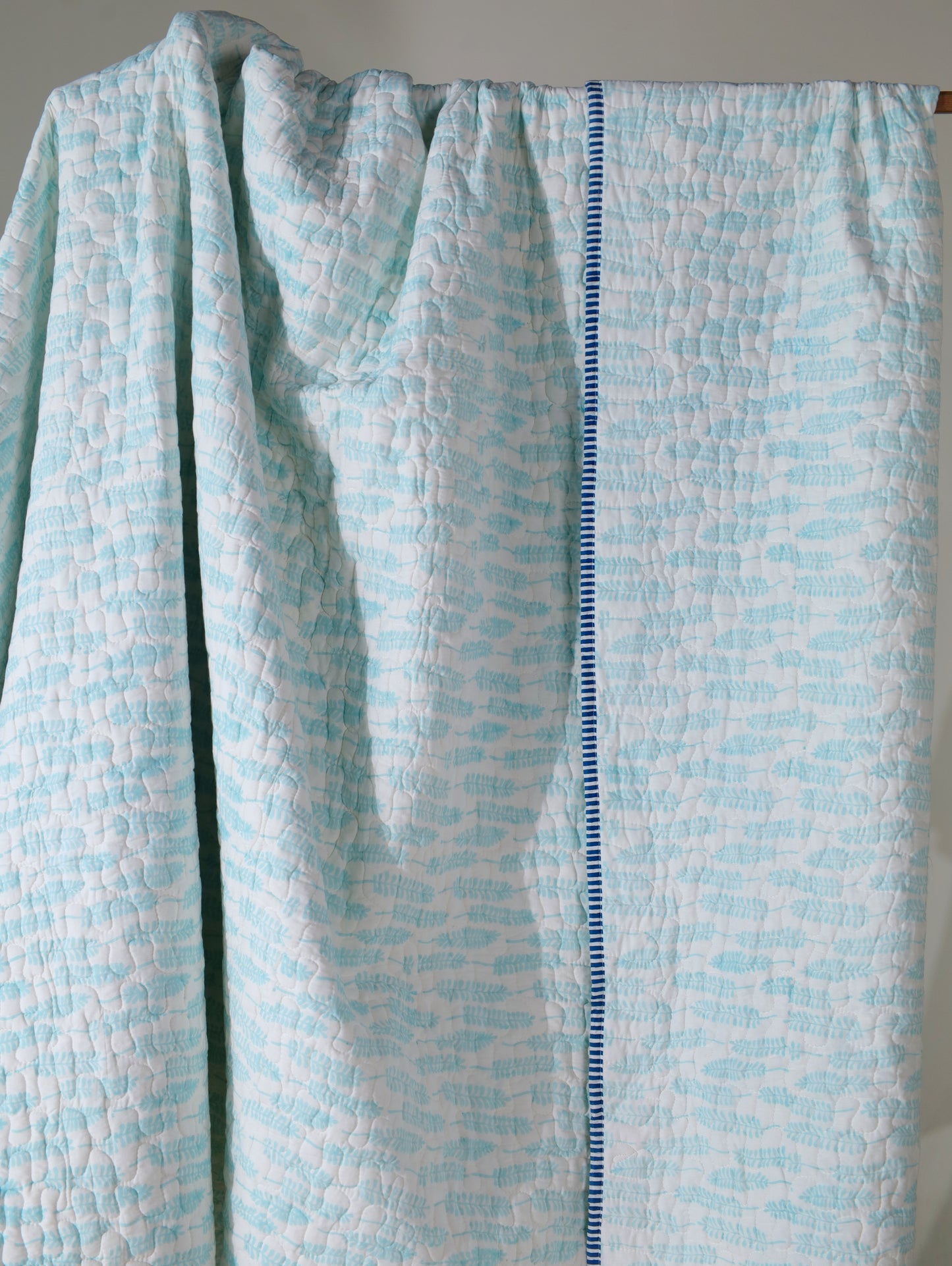 Sky blue long leaves jaal mulmul quilt