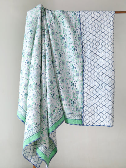 Blue and sea green scattered ethnic mulmul quilt