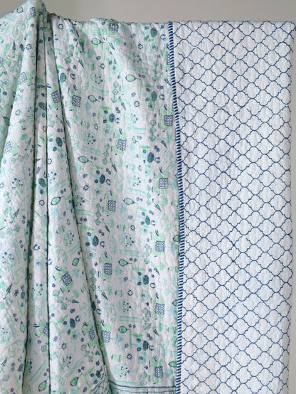 Blue and sea green scattered ethnic mulmul quilt
