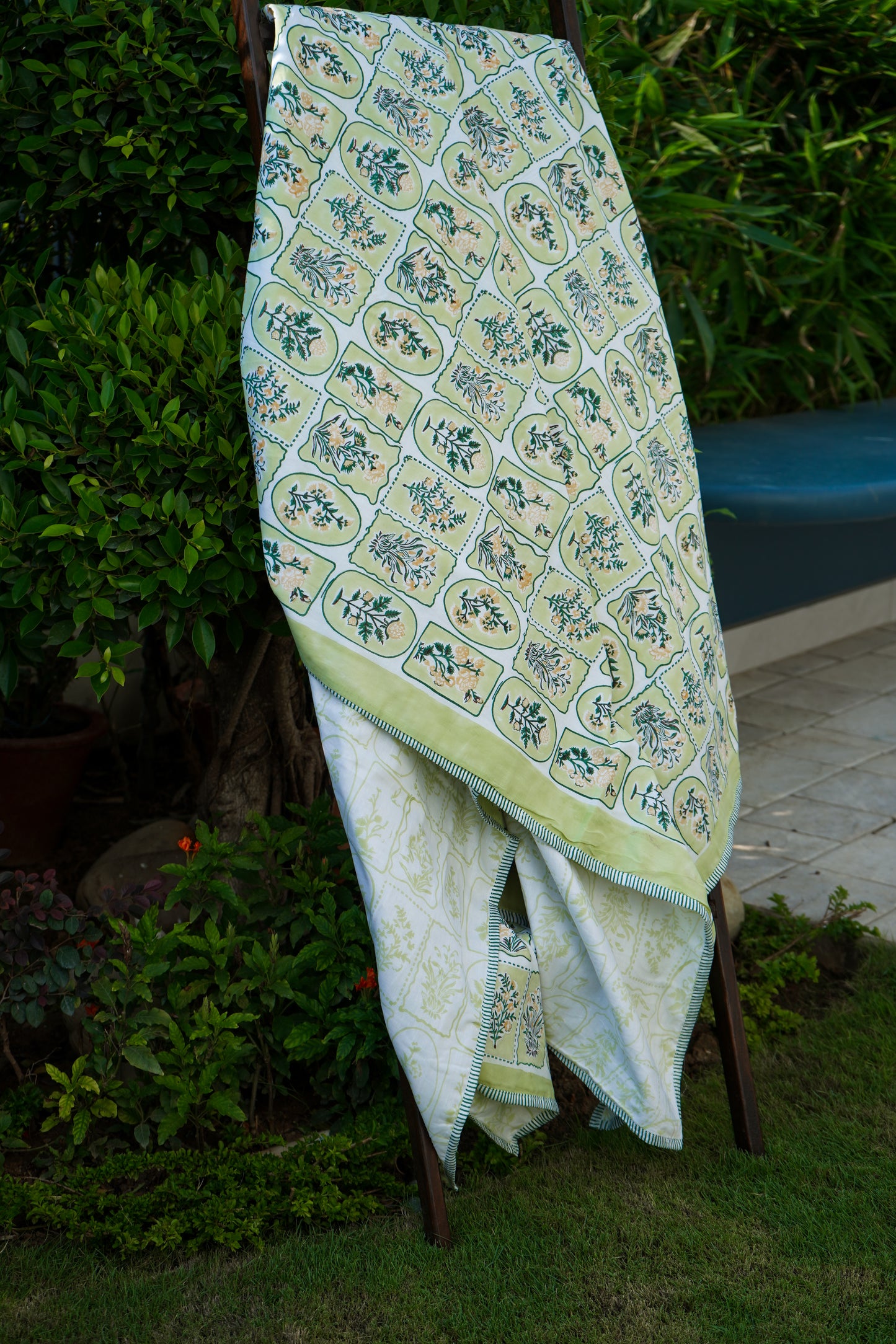 Green and yellow motif tiles mulmul dohar