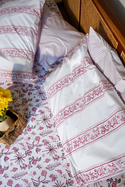 Magenta and maroon nariyal tree bedsheet set (scattered floral)