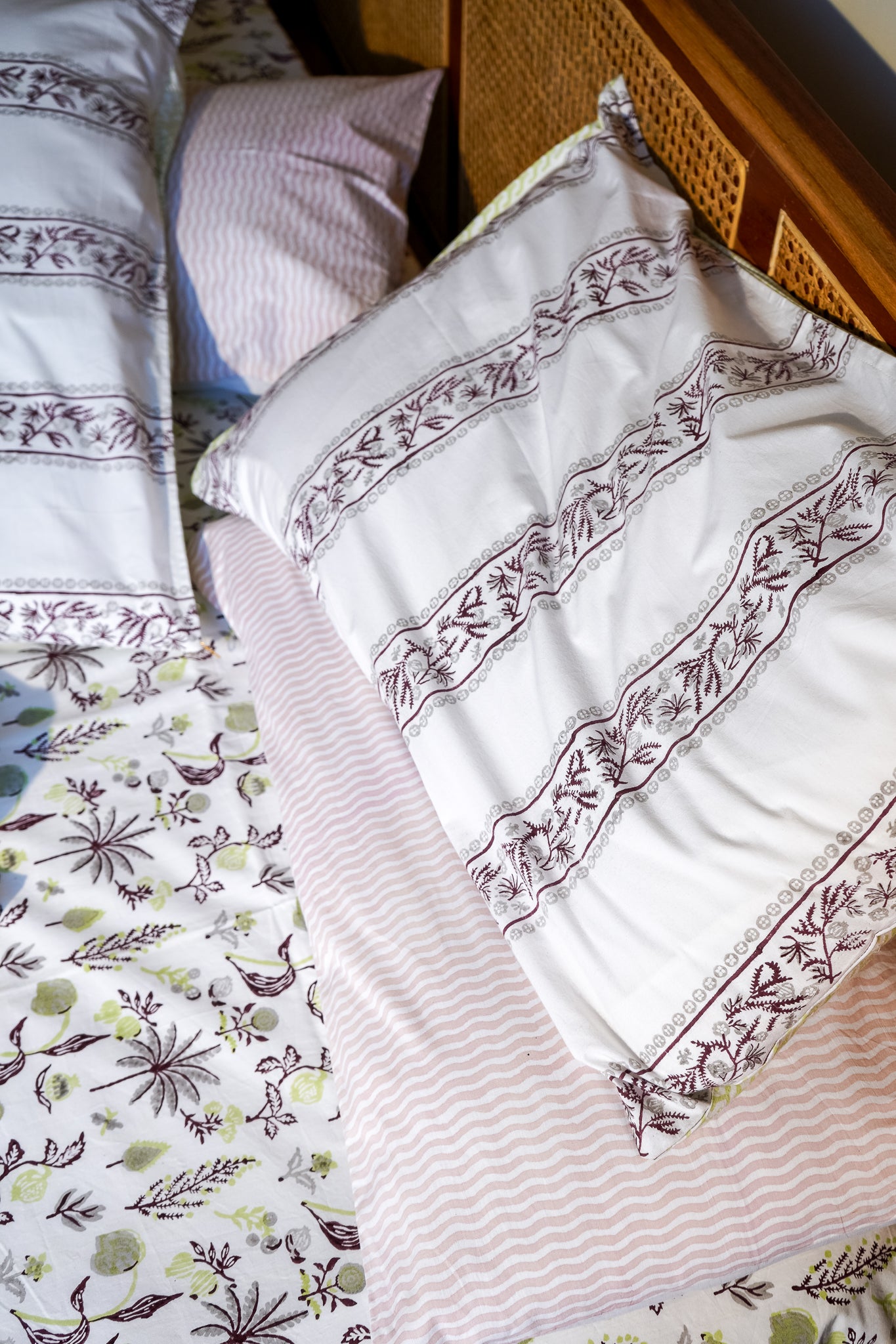Parrot maroon and grey nariyal tree bedsheet set (scattered floral)