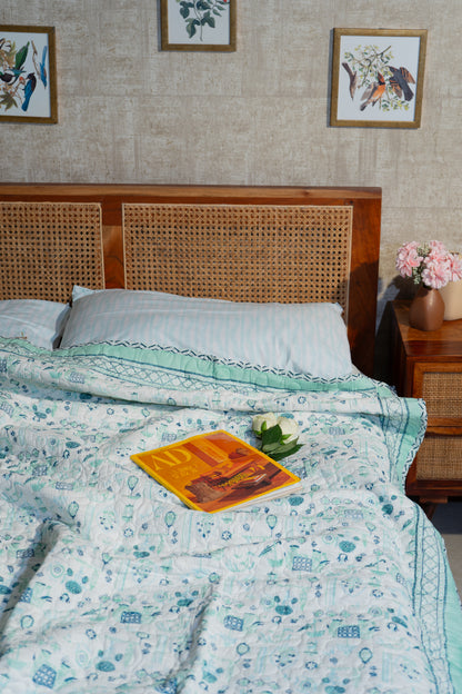 Blue and sea green scattered ethnic mulmul quilt