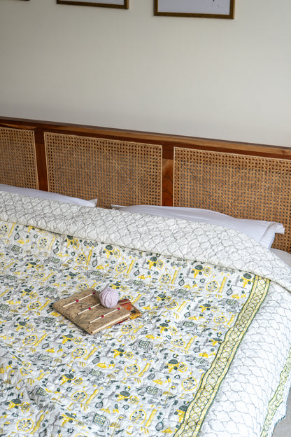 Grey green and yellow scattered ethnic mulmul quilt