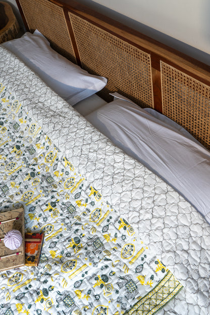 Grey green and yellow scattered ethnic mulmul quilt