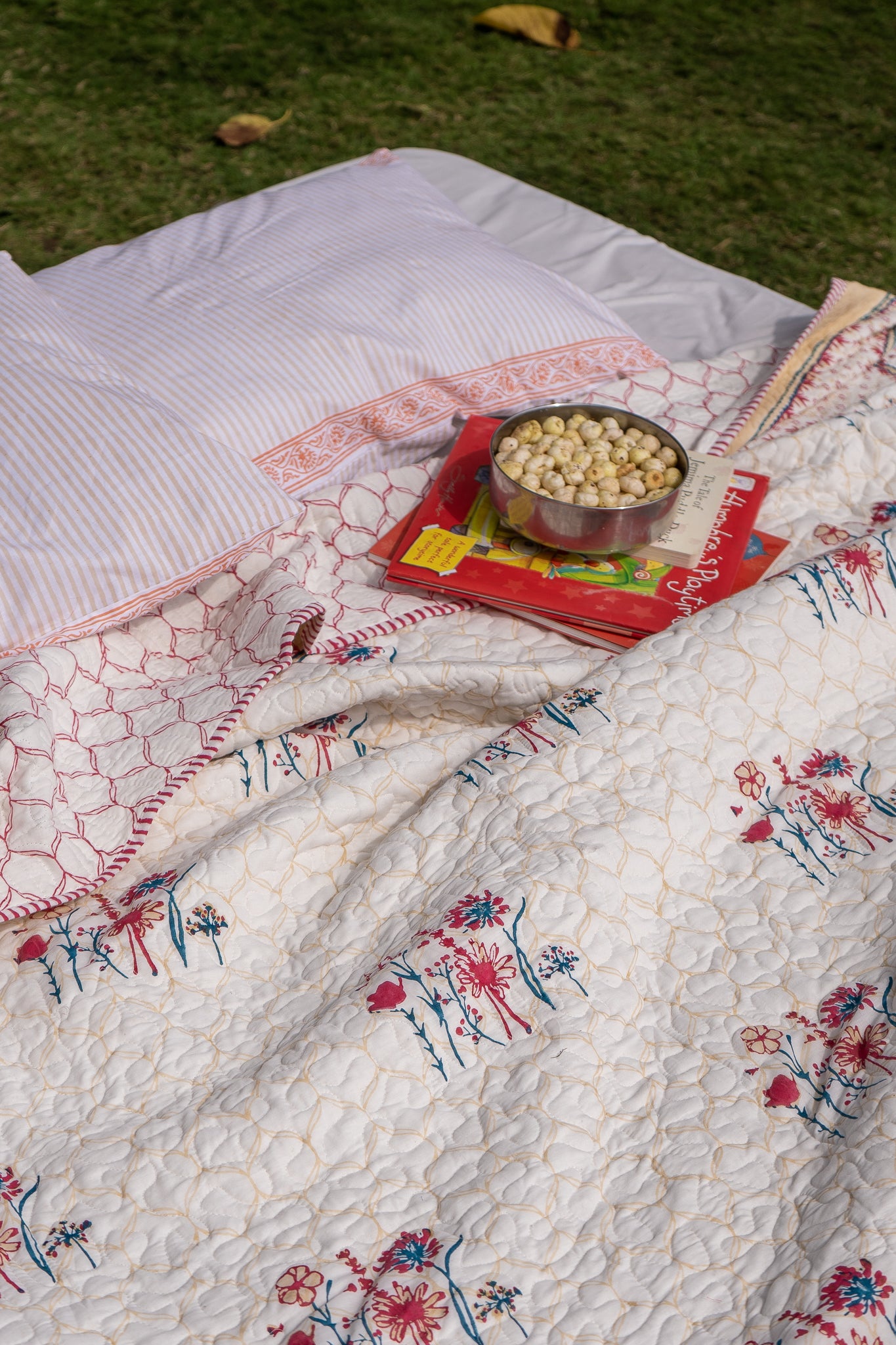 Magenta yellow and blue blooming flowers mulmul quilt