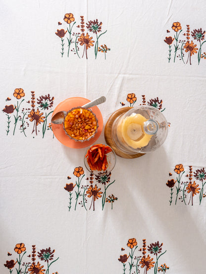 Maroon orange blooming flowers table cover